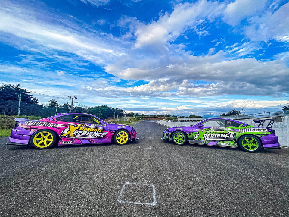 two formula drift competition Nissan S15's. 